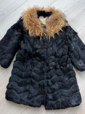 Black fur coat with tan fur collar